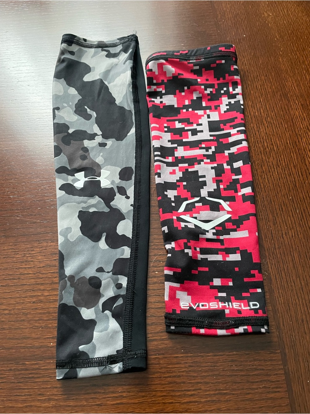 Under Armour gray & black camo &Evoshield red & black camo kids’ arm Sleeves